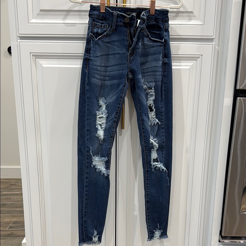Distressed Blue Jeans